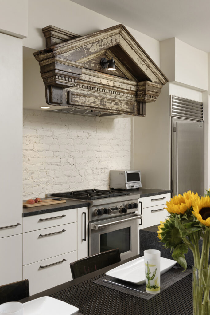 BOWA design build row home renovation in Washington, DC Stove hood detail industrial kitchen | Contemporary / Modern