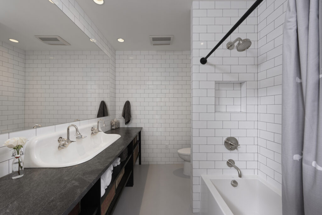 BOWA design build row home renovation in Washington, DC Guest Bathroom with Subway Tile | Contemporary / Modern