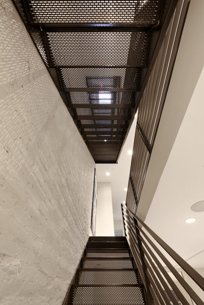 BOWA design build row home renovation in Washington, DC Two-Story Metal Staircase Industrial | Contemporary / Modern