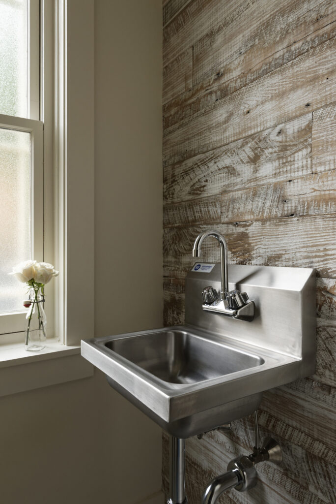 BOWA design build row home renovation in Washington, DC powder room sink | Contemporary / Modern