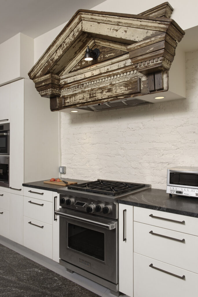 BOWA design build row home renovation in Washington, DC industrial kitchen stove hood | Contemporary / Modern